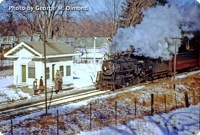 Engine 3676 has a Boston-bound train at Pierces Bridge Station, which was near Maple Street in Lexington, on March 13, 1954